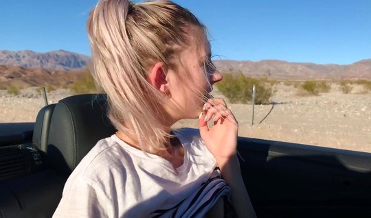 Tiny Tin in the car right in public massages a smooth shaved pussy with her hand
