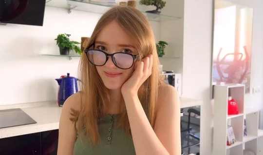 Young shy girl with glasses finally decided to suck